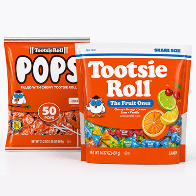 Tootsie Roll Pops orange-flavored lollipops and The Fruit Ones share-size assorted fruit-flavored candy bags displayed side by side.