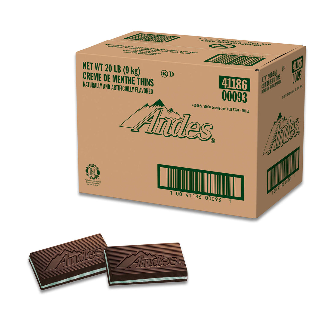 Cardboard box of Andes creme de menthe thins with two individual bars in front on a white background