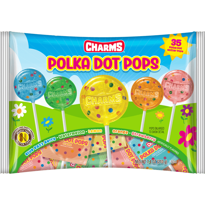 Packaging of Charms Polka Dot Pops with colorful lollipops on a green field background.