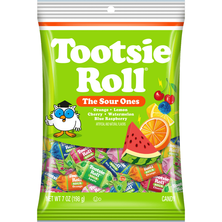 A 7 oz bag of Tootsie Roll 'The Sour Ones' sour candy mix, featuring a bright green bag with illustrations of watermelon, orange, cherries, and a cartoon owl, with the assorted colorful candy pieces visible through the clear lower section.