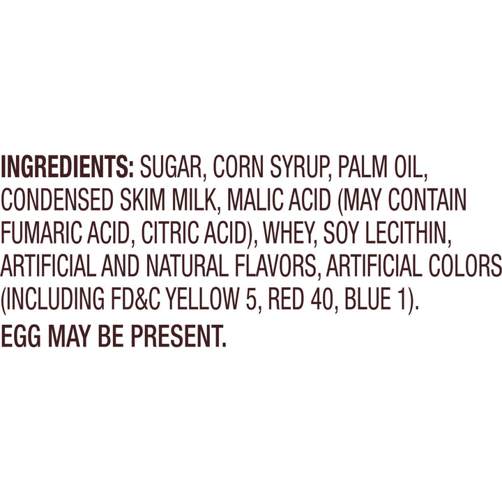 A text-only informational graphic on a white background listing ingredients such as sugar, corn syrup, palm oil, condensed skim milk, malic acid, whey, soy lecithin, artificial and natural flavors, artificial colors, and noting that egg may be present.