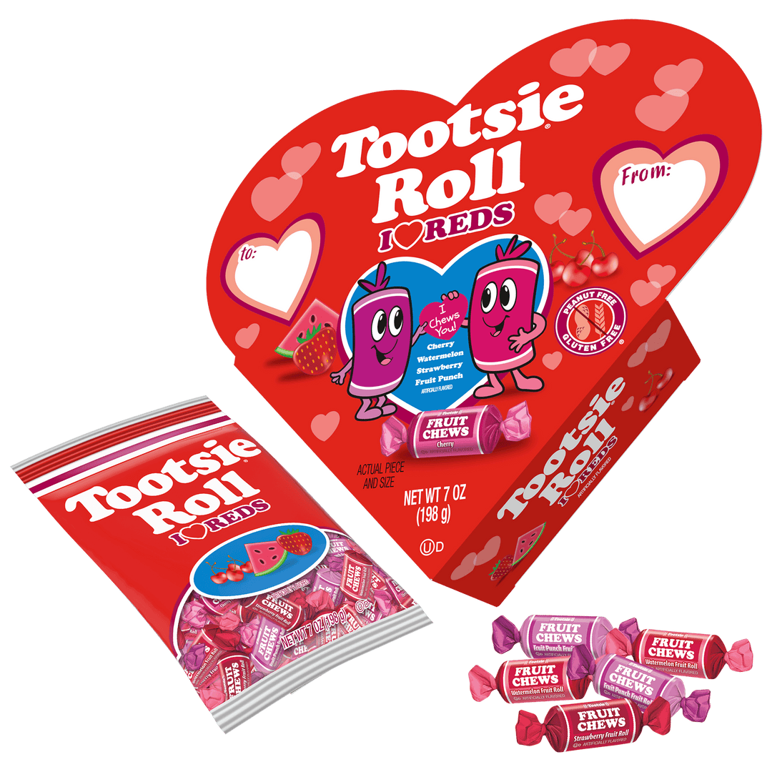 Heart-shaped Tootsie Roll candy package with pink candies on a black background