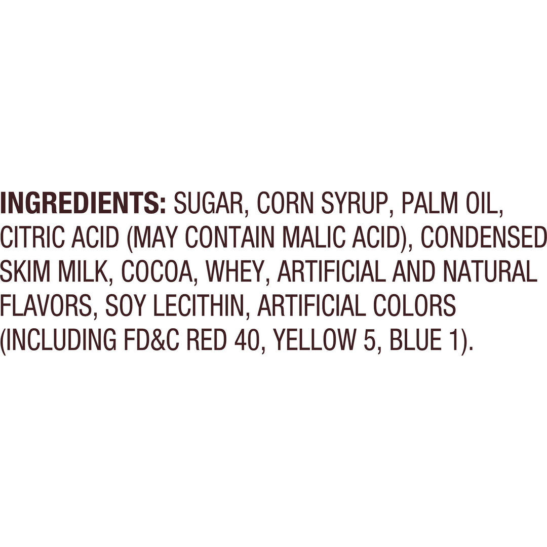 List of ingredients in bold text on a white background, including sugar, corn syrup, palm oil, citric acid, condensed skim milk, cocoa, whey, artificial and natural flavors, soy lecithin, and artificial colors such as FD&C Red 40, Yellow 5, Blue 1.