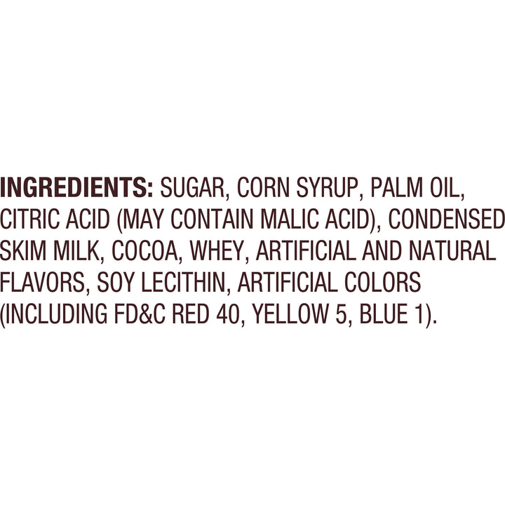 Text image listing ingredients: sugar, corn syrup, palm oil, citric acid, condensed skim milk, cocoa, whey, flavors, soy lecithin, and colors.