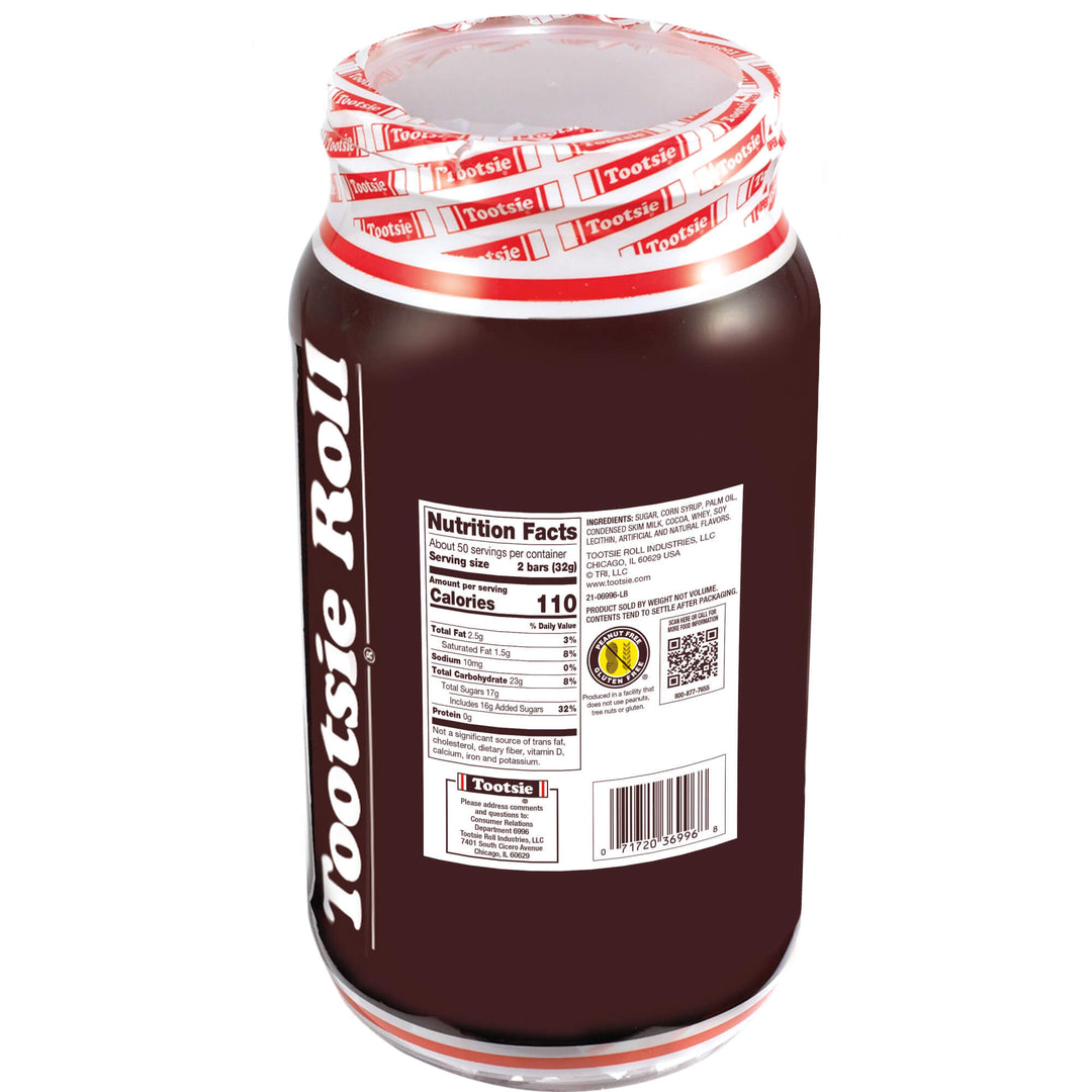 Jar of Tootsie Roll candy with label and red and white lid on a white background