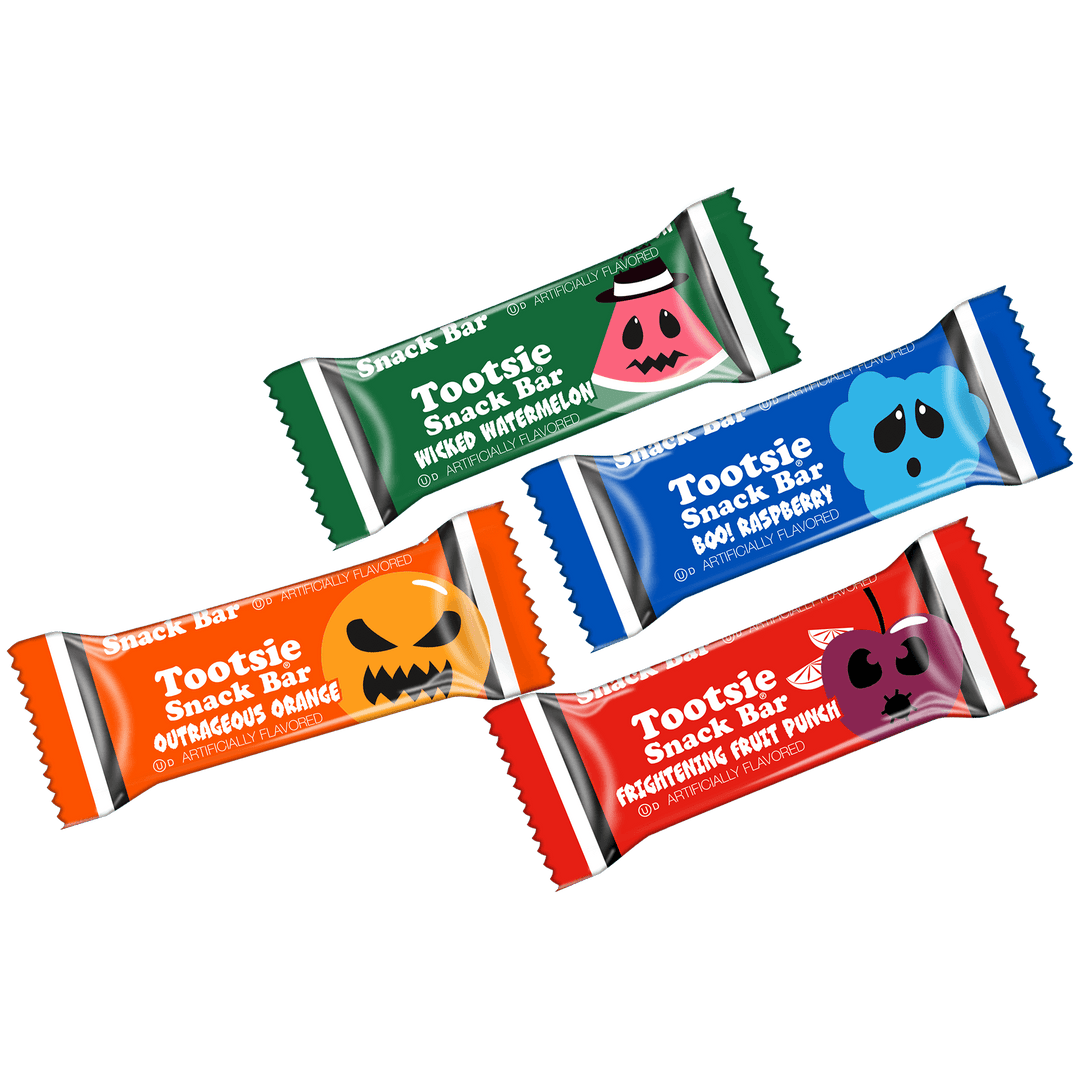 Four Tootsie snack bars in different flavors on a black background